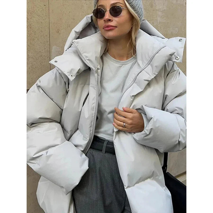 Veste matelassée femme – Coupe oversize – Déperlante – Capuche à pressions – Mi-longue