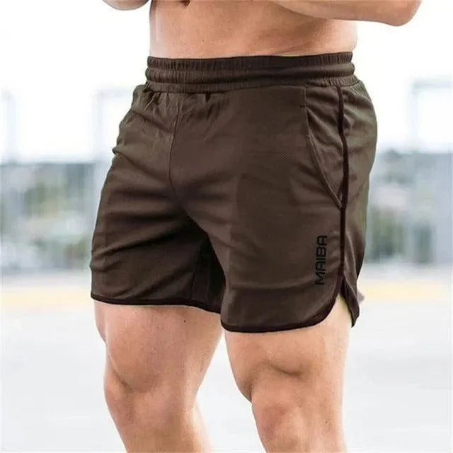 Short de Sport Homme - Taille Élastique - Coupe Courte avec Fentes - Poches Pratiques