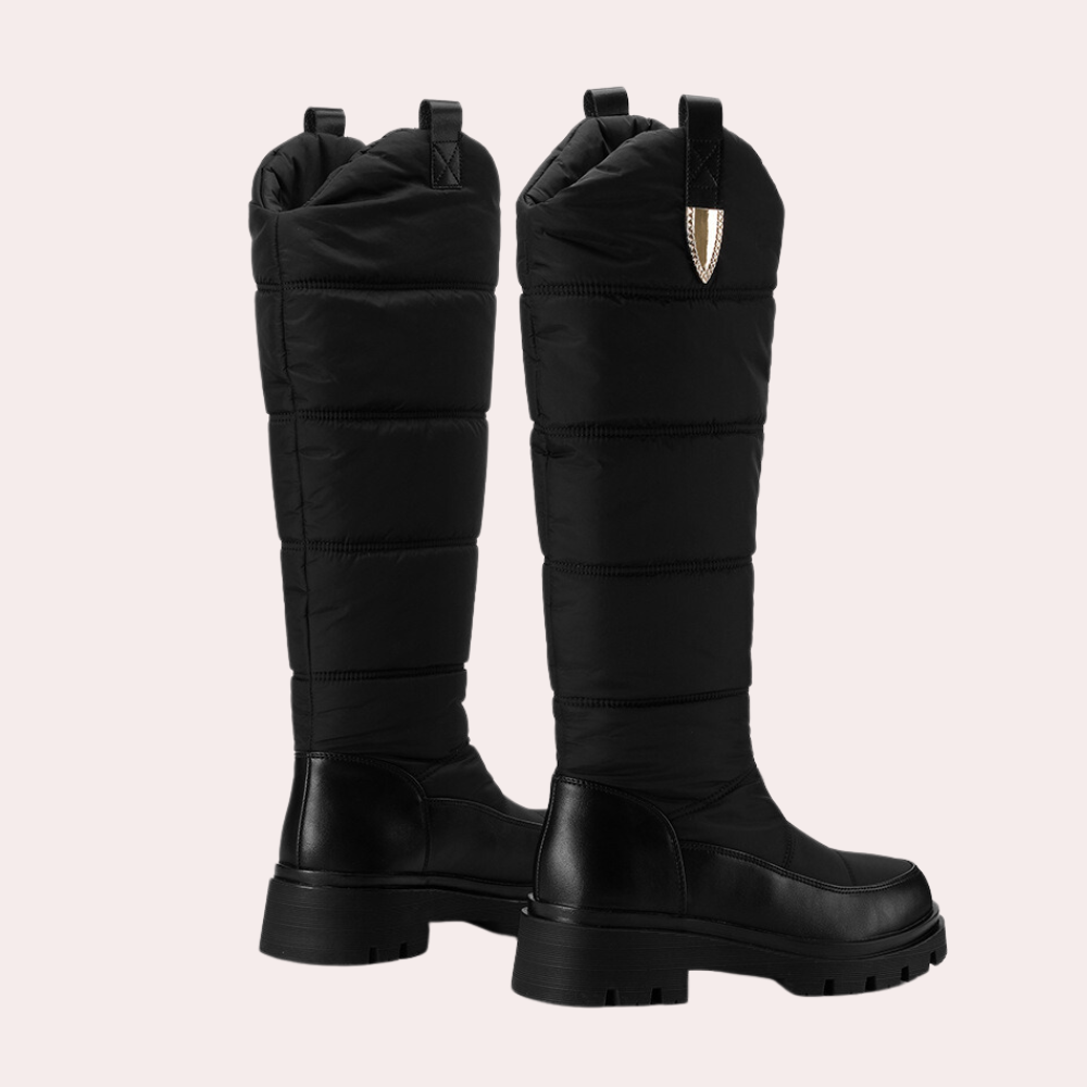 Bottes hautes femme – Coupe ajustée – Finition brillante – Détails matelassés – Semelle crantée