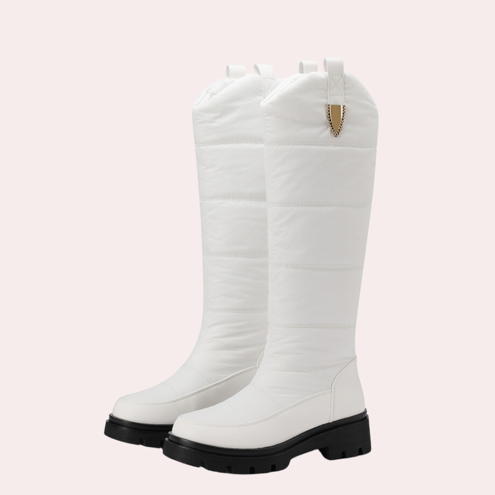 Bottes hautes femme – Coupe ajustée – Finition brillante – Détails matelassés – Semelle crantée