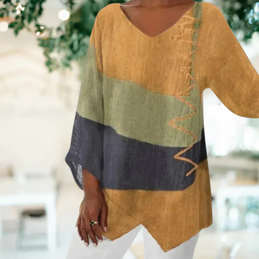 Blouse femme – Coupe décontractée – Tissu respirant – Manches 3/4 – Ourlet asymétrique