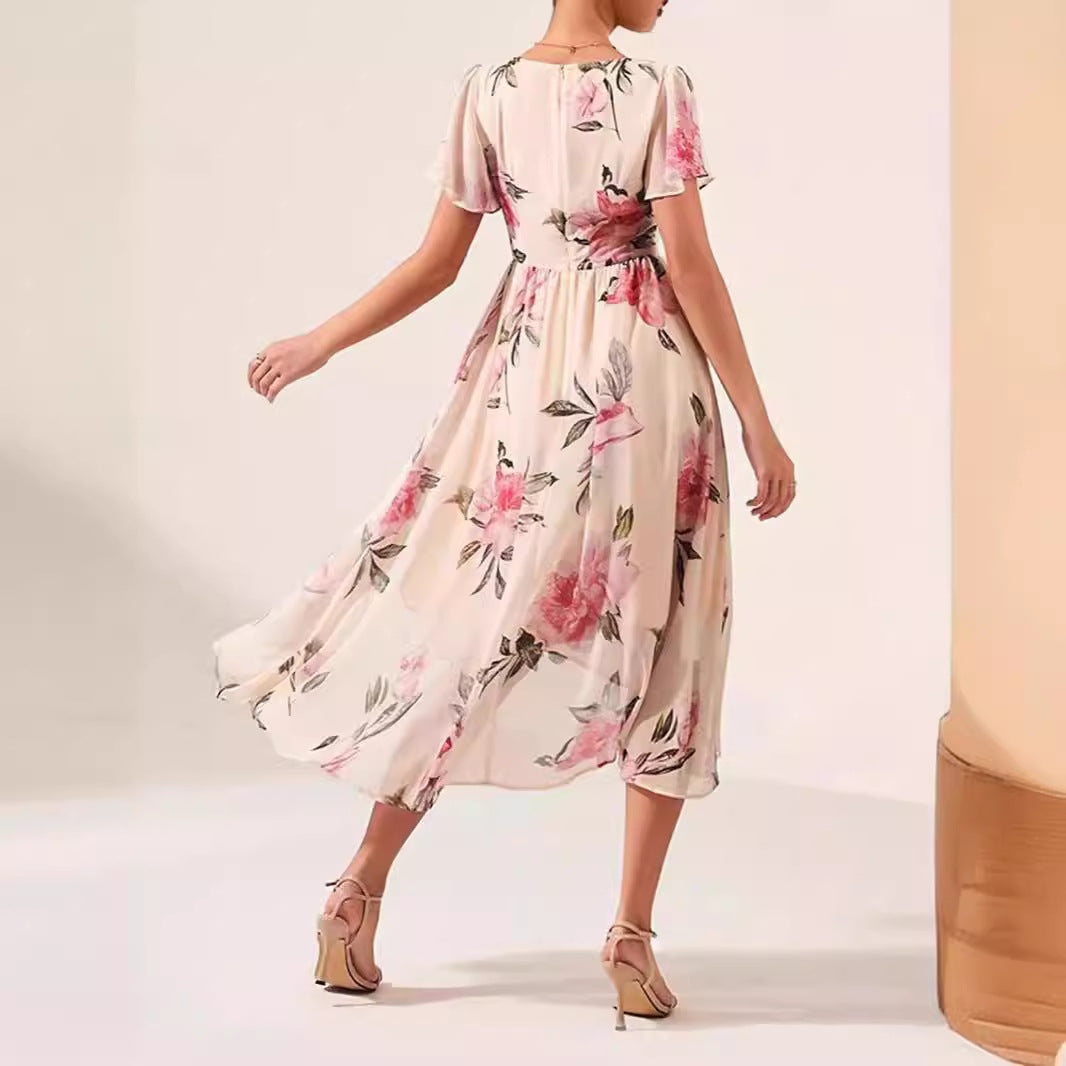Robe femme – Imprimé fleuri – Col en V – Manches volantées – Taille nouée – Ourlet asymétrique