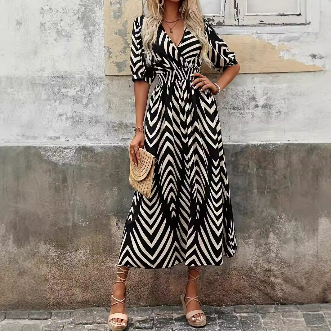 Robe midi femme – Coupe évasée fluide – Décolleté croisé – Manches bouffantes – Taille ceinturée – Motif rayé