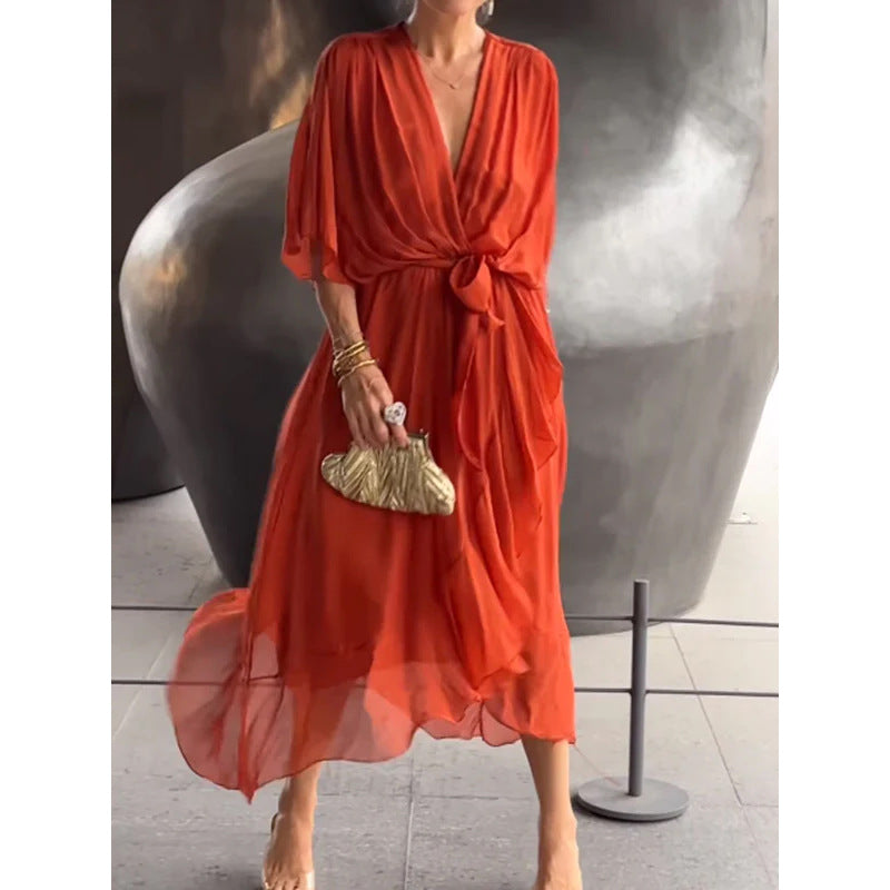 Robe longue femme – Tissu fluide élégant – Manches chauve-souris – Taille nouée – Ourlet asymétrique