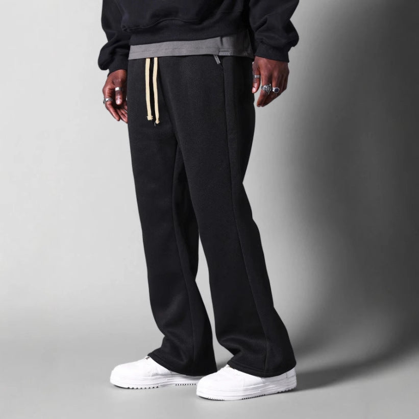 Pantalon de jogging homme – Coton molletonné – Coupe ample – Jambe évasée – Taille cordon
