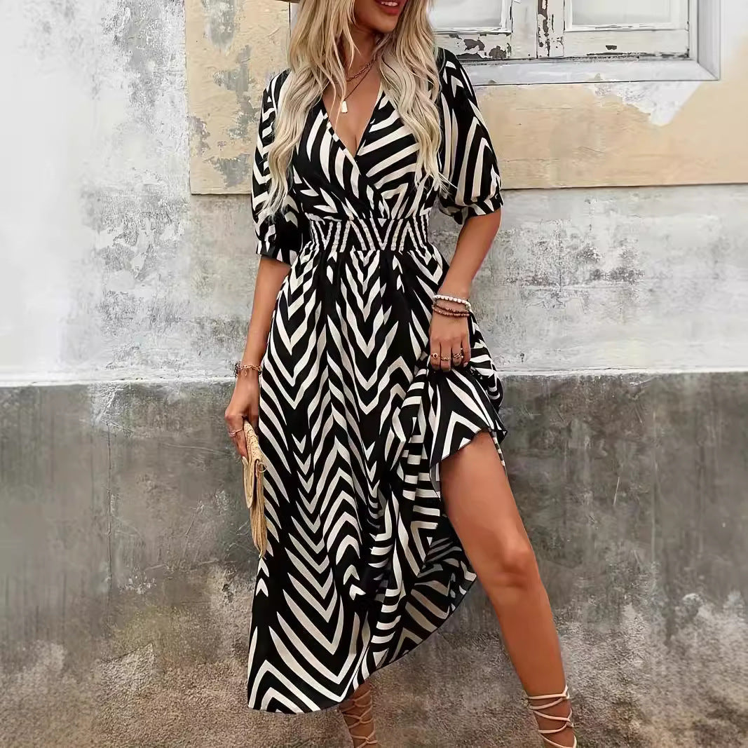 Robe midi femme – Coupe évasée fluide – Décolleté croisé – Manches bouffantes – Taille ceinturée – Motif rayé