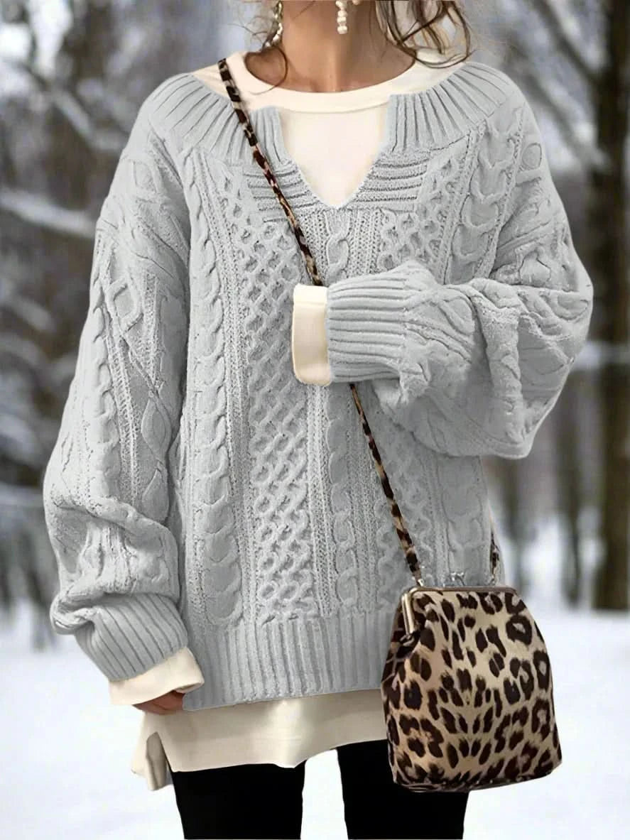 Pull ample à col en V élégant, confortable et polyvalent pour femme.