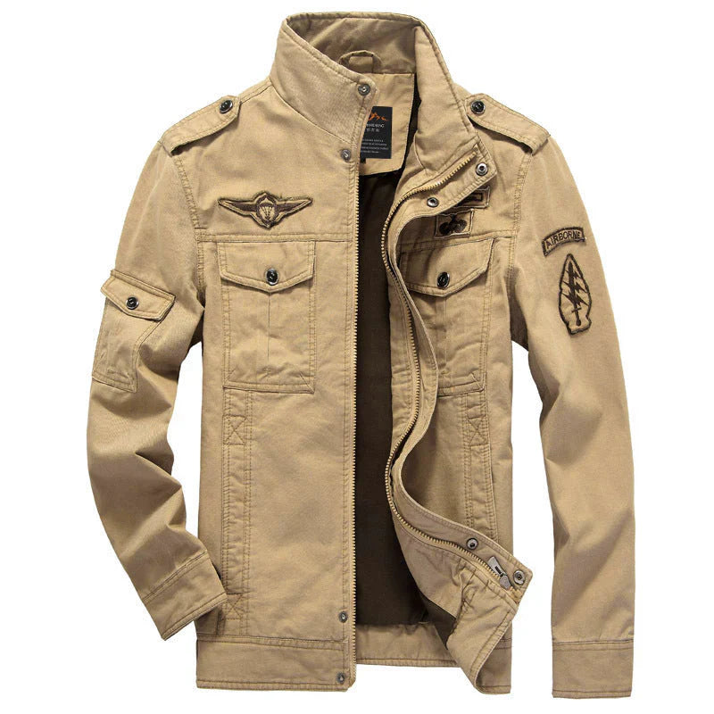 Veste homme – Coupe structurée – Coton – Col montant – Poches utilitaires – Épaulettes