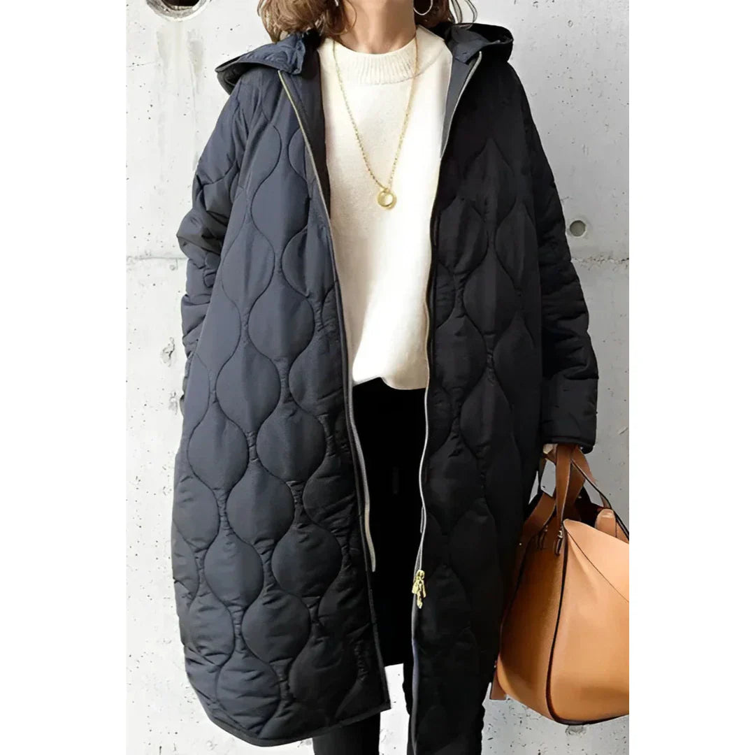 Veste matelassée femme – Coupe oversize – Longue – Capuche – Fermeture zippée