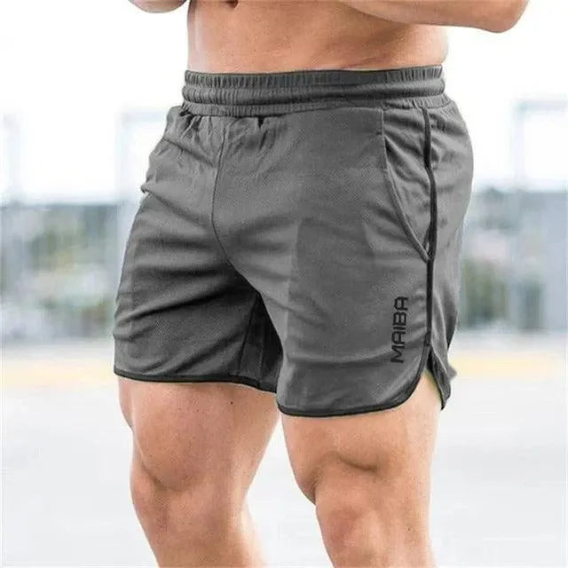 Short de Sport Homme - Taille Élastique - Coupe Courte avec Fentes - Poches Pratiques