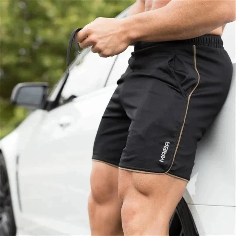 Short de Sport Homme - Taille Élastique - Coupe Courte avec Fentes - Poches Pratiques