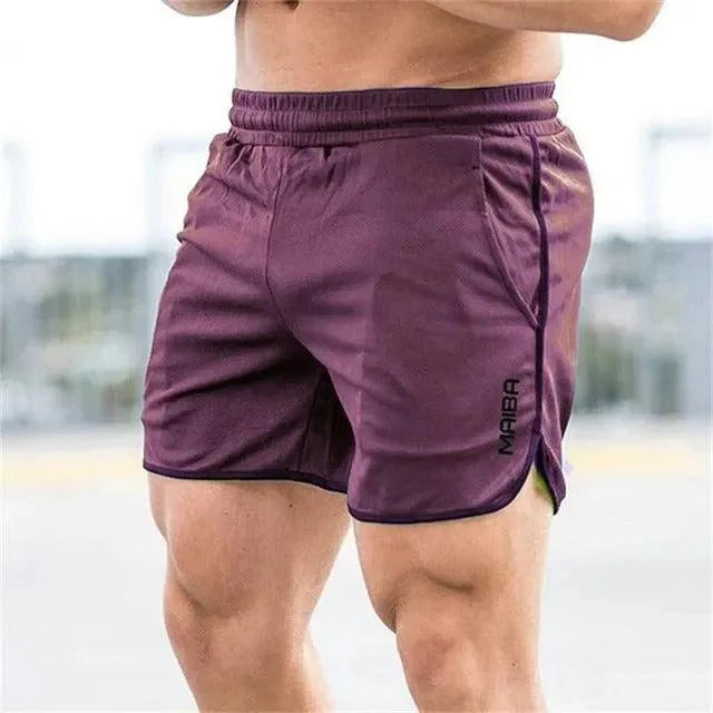 Short de Sport Homme - Taille Élastique - Coupe Courte avec Fentes - Poches Pratiques