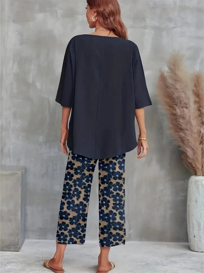 Ensemble haut asymétrique chic et pantalon large à fleurs pour femme