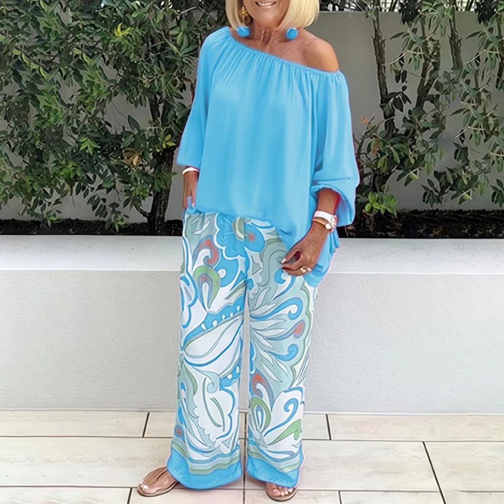 Blouse femme – Coupe ample – Épaules dénudées – Manches 3/4 – Détail pompons