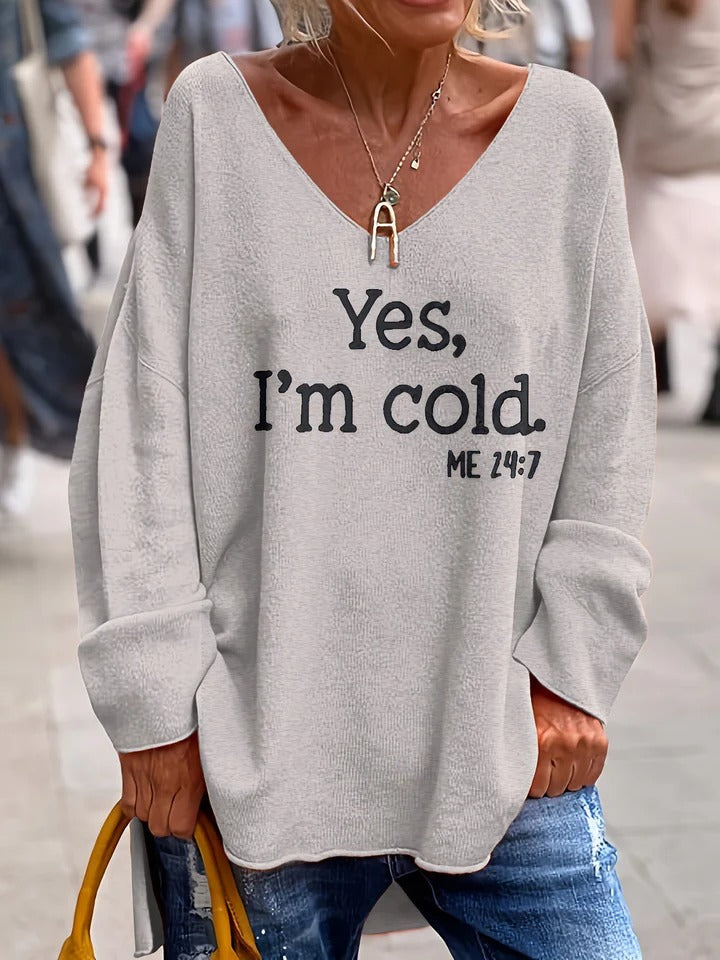 Pull femme – Maille douce – Coupe oversize – Col V – Épaules tombantes – Imprimé texte
