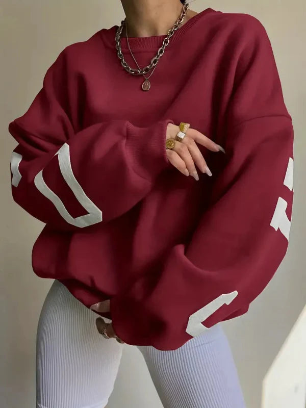 Sweatshirt femme – Coupe oversize – Coton doux – Épaules tombantes – Motif sur manche