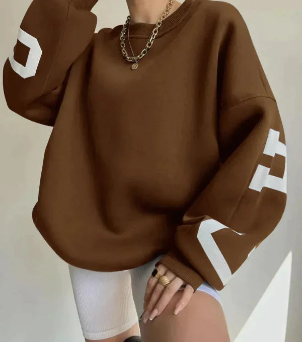 Sweatshirt femme – Coupe oversize – Coton doux – Épaules tombantes – Motif sur manche