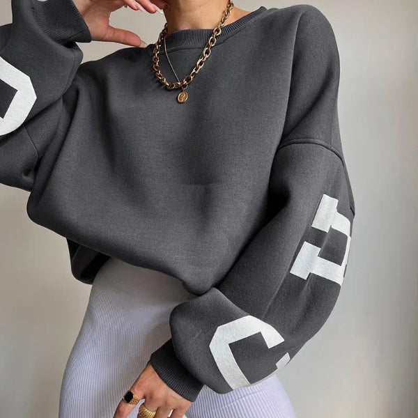 Sweatshirt femme – Coupe oversize – Coton doux – Épaules tombantes – Motif sur manche