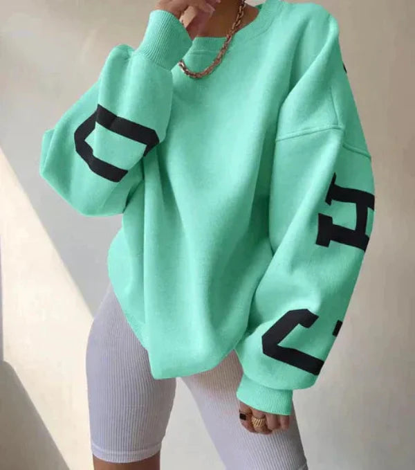 Sweatshirt femme – Coupe oversize – Coton doux – Épaules tombantes – Motif sur manche