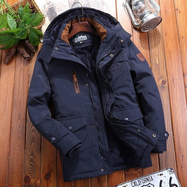 Veste homme oversize – Capuche – Épaules matelassées – Poches zippées – Doublure chaude