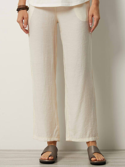 Pantalon femme – Coupe droite ample – Tissu froissé – Taille élastique – Poches latérales