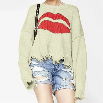 Pull femme – Maille épaisse – Coupe oversize – Motif lèvres – Ourlet frangé