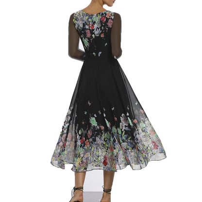 Robe longue femme – Tulle léger – Appliqués floraux – Manches transparentes – Coupe élégante