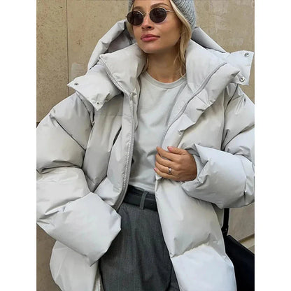 Veste matelassée femme – Coupe oversize – Déperlante – Capuche à pressions – Mi-longue
