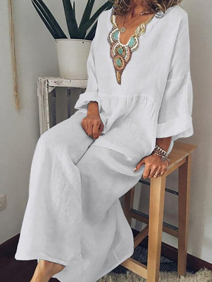 Nina - Robe longue élégante avec décolleté ornementé