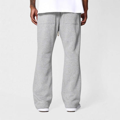 Pantalon de jogging homme – Coton molletonné – Coupe ample – Jambe évasée – Taille cordon