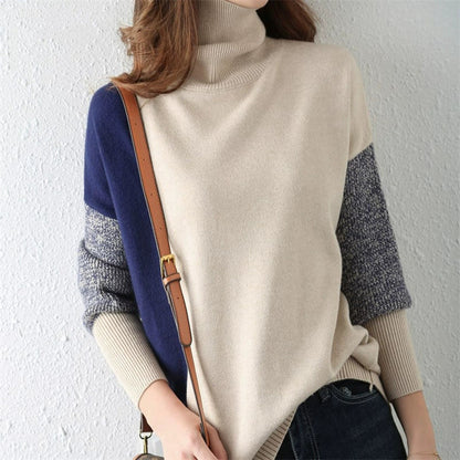 Pull femme – Coupe ample – Col montant – Maille douce – Détails côtelés
