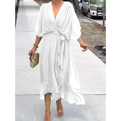 Robe longue femme – Tissu fluide élégant – Manches chauve-souris – Taille nouée – Ourlet asymétrique