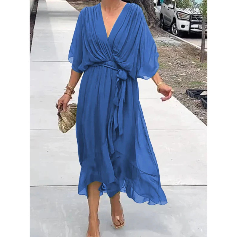 Robe longue femme – Tissu fluide élégant – Manches chauve-souris – Taille nouée – Ourlet asymétrique