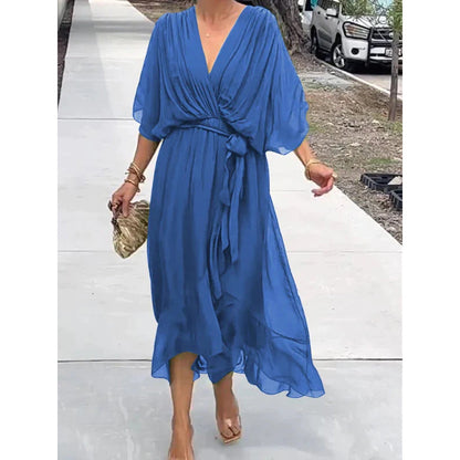 Robe longue femme – Tissu fluide élégant – Manches chauve-souris – Taille nouée – Ourlet asymétrique