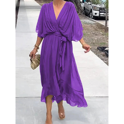 Robe longue femme – Tissu fluide élégant – Manches chauve-souris – Taille nouée – Ourlet asymétrique