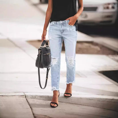 Jean femme – Coupe droite décontractée – Effet usé – Ourlet effiloché