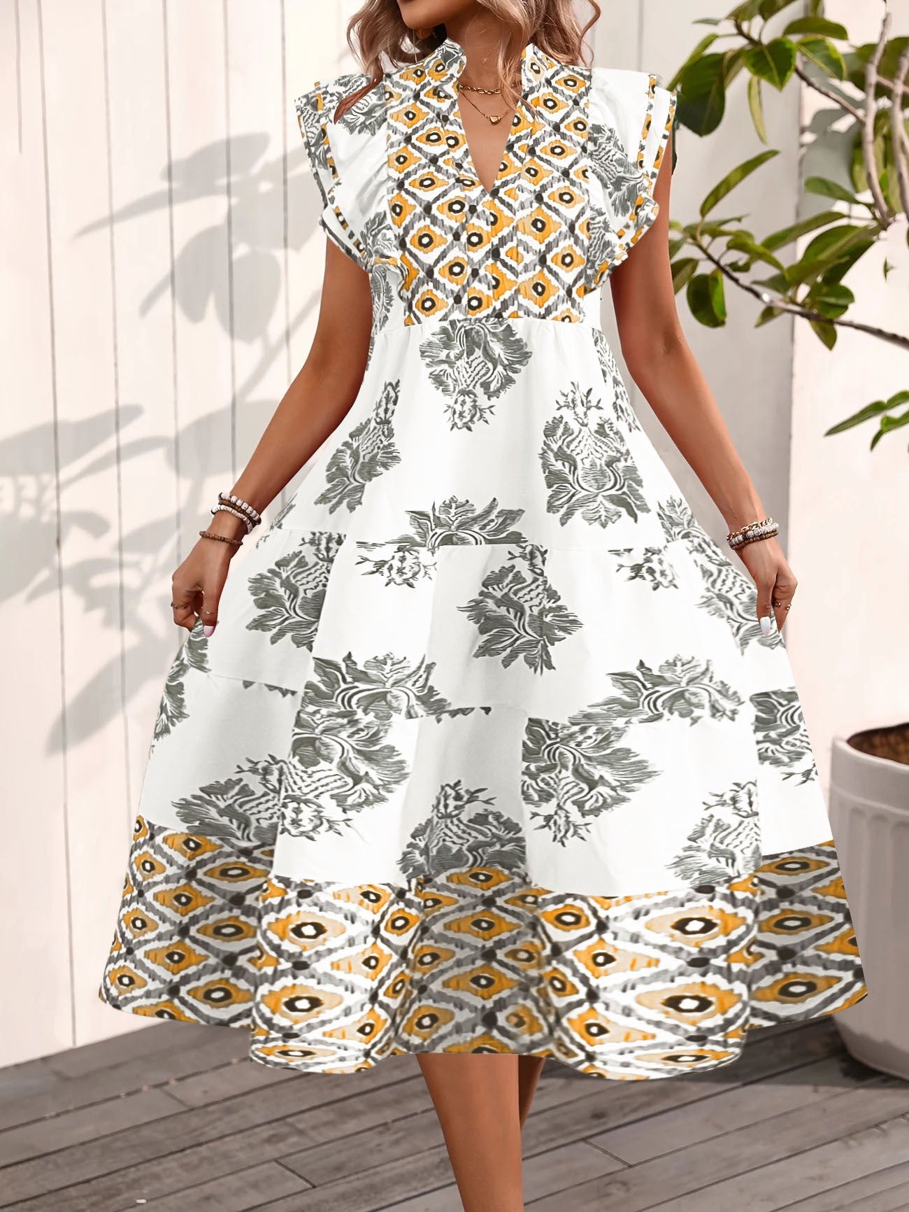 Robe femme – Coupe évasée fluide – Col montant – Manches volantes – Imprimé floral