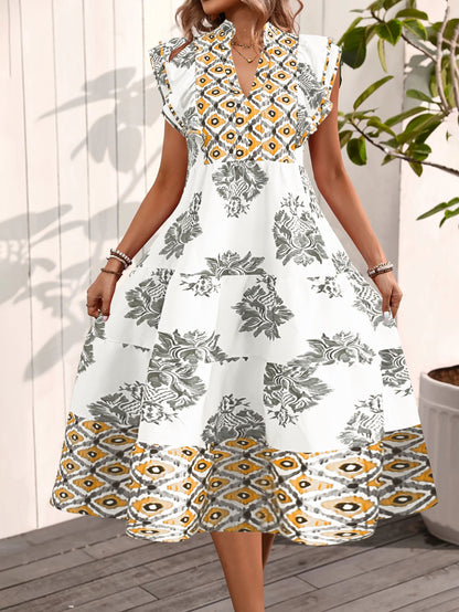 Robe femme – Coupe évasée fluide – Col montant – Manches volantes – Imprimé floral