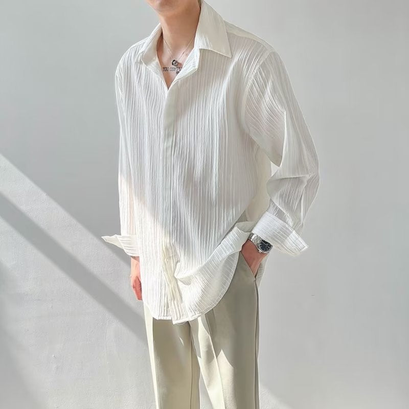 Chemise unisexe manches longues – coupe oversize – tissu froissé texturé – col classique