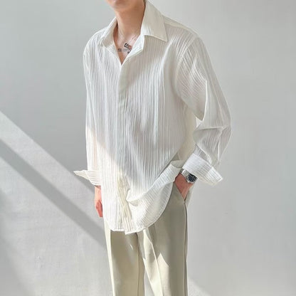 Chemise unisexe manches longues – coupe oversize – tissu froissé texturé – col classique