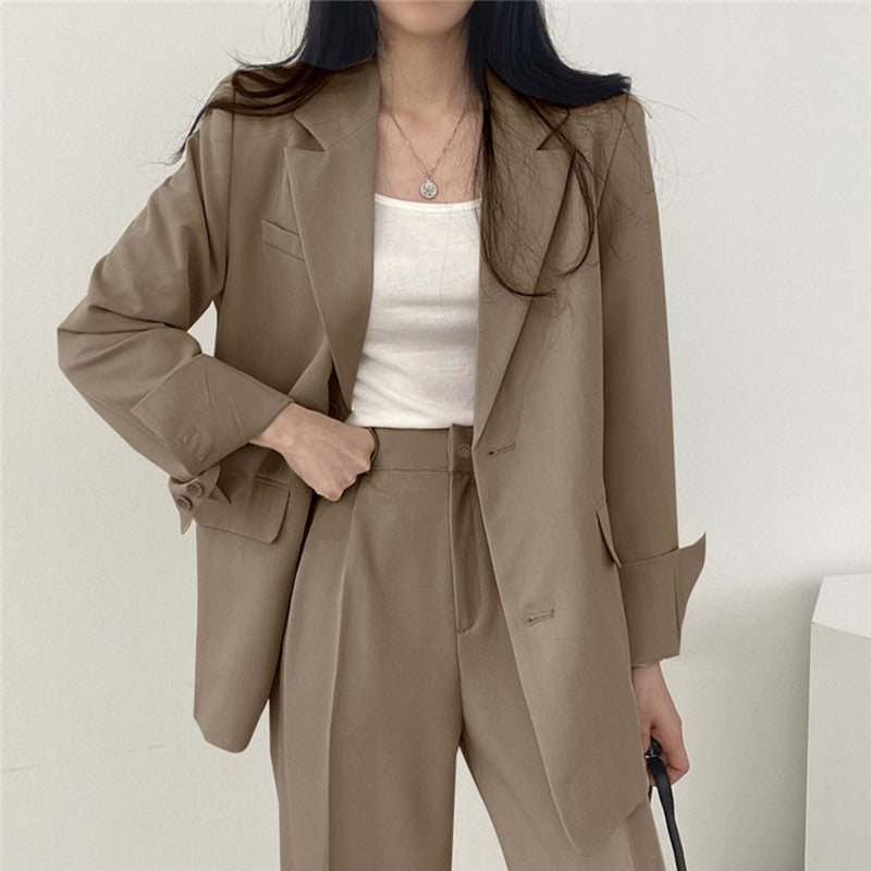 Veste tailleur femme – Coupe structurée – Revers crantés – Longueur hanches – Boutonnage simple