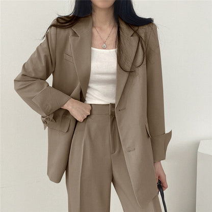 Veste tailleur femme – Coupe structurée – Revers crantés – Longueur hanches – Boutonnage simple