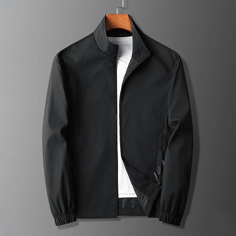 Veste active homme – Coupe slim – Tissu léger respirant – Col montant zippé – Poches sécurisées