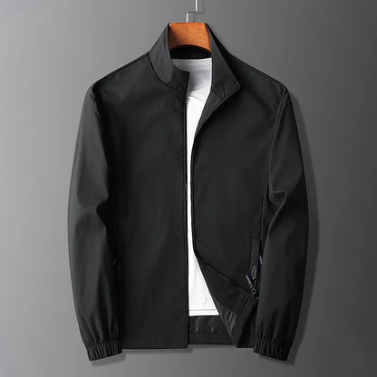 Veste active homme – Coupe slim – Tissu léger respirant – Col montant zippé – Poches sécurisées
