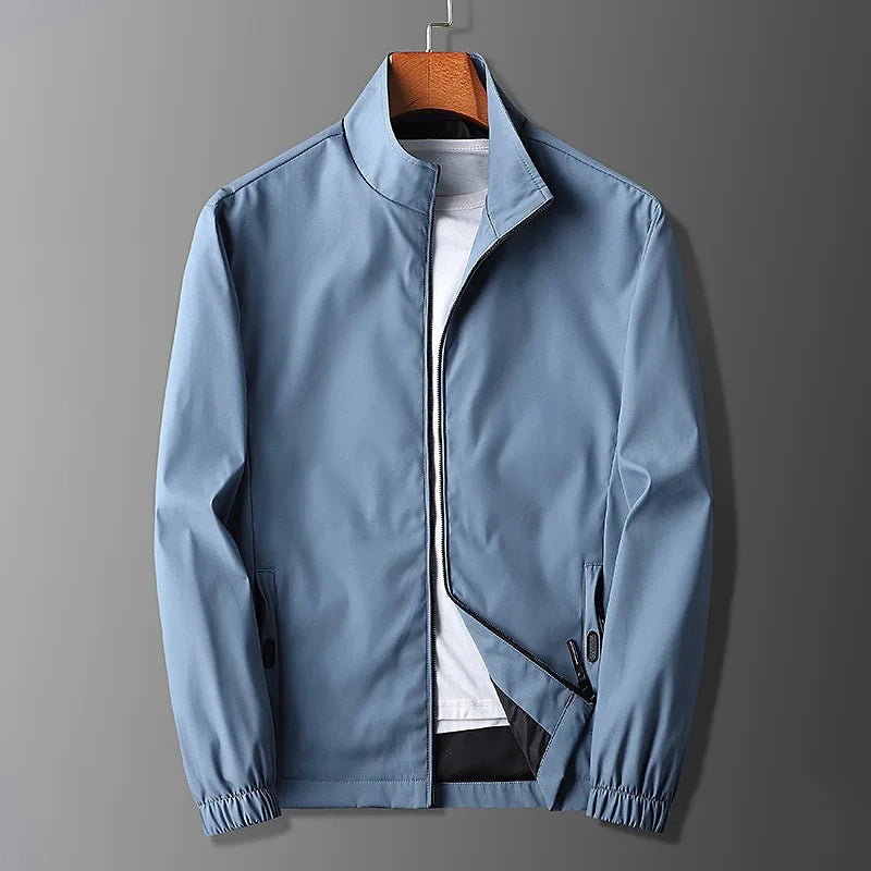 Veste active homme – Coupe slim – Tissu léger respirant – Col montant zippé – Poches sécurisées