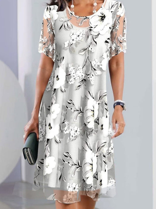 Robe midi femme – Imprimé fleuri – Coupe ample fluide – Manches courtes – Col rond
