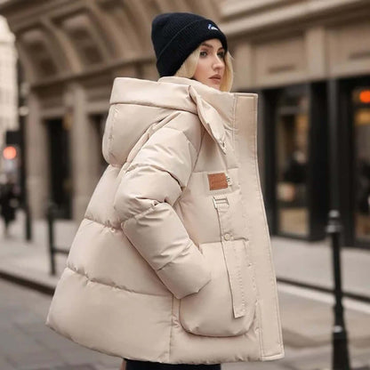 Veste matelassée femme – Coupe ample – Capuche – Poches – Poignets côtelés