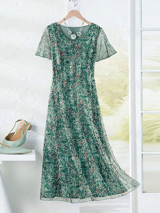 Robe longue femme – Tissu respirant – Coupe fluide – Imprimé fleuri – Manches courtes