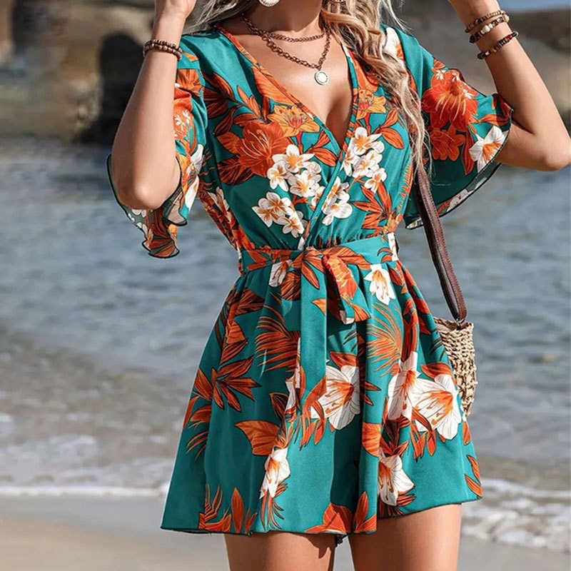 Combinaison courte femme – Col cache-cœur – Manches volantées – Ceinture nouée – Imprimé fleuri