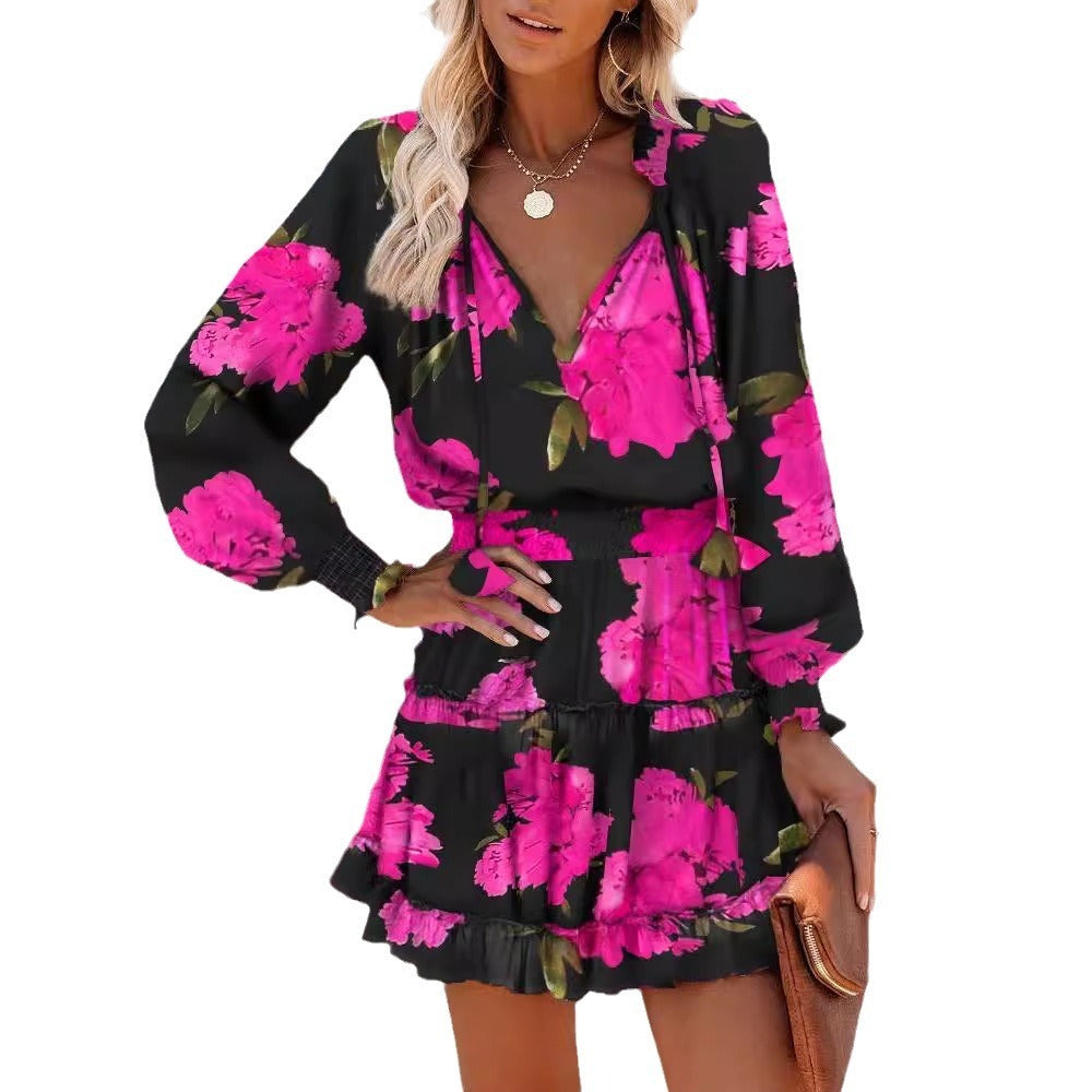 Robe femme – coupe évasée – manches longues – col en V – motif imprimé – taille smockée